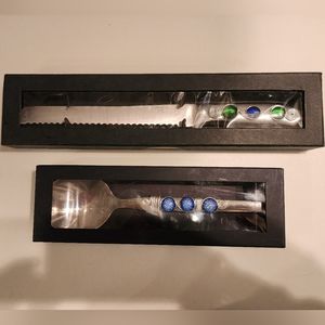 Wild Eye Designs stainless steel serving spoon and large serrated knife